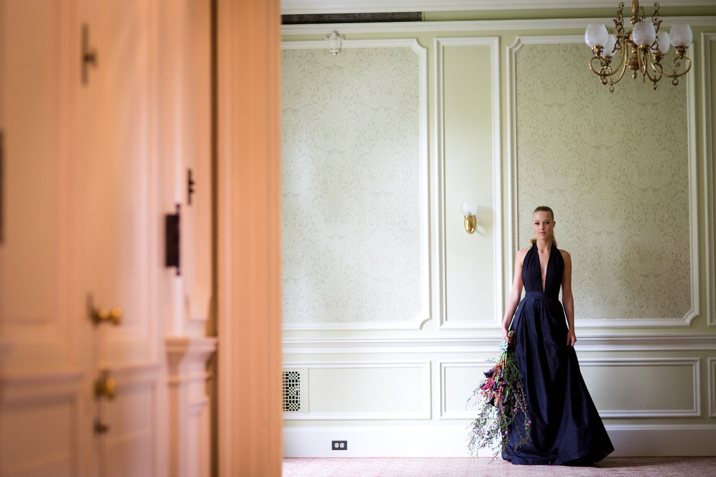 Model wearing a Priscilla Couture black Risk bridal skirt