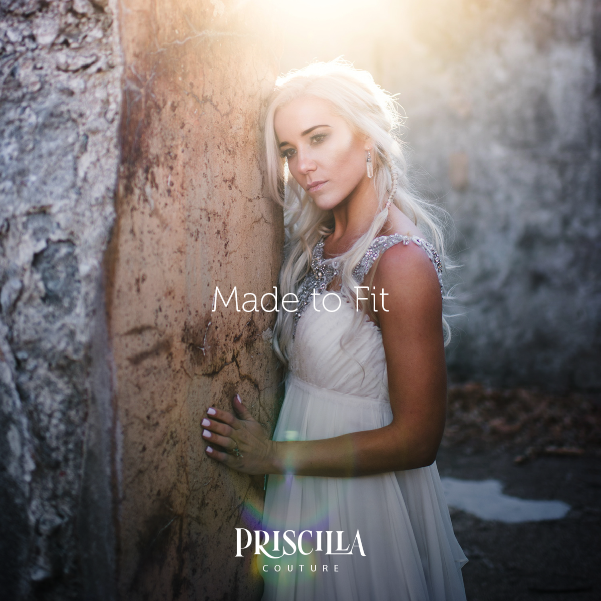 Bride in a Game of Thrones fantasy theme wedding. Bride dressed in a Priscilla Couture wedding dress.