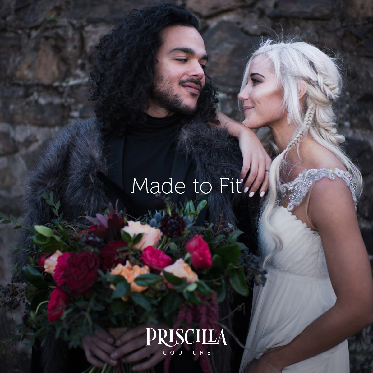 Bride and Groom in a Game of Thrones theme wedding. Bride dressed in a Priscilla Couture wedding dress.