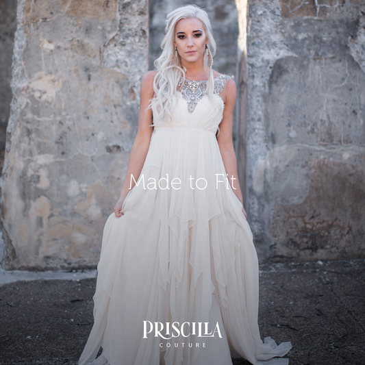Bride in a Game of Thrones theme wedding dress by Priscilla Couture.