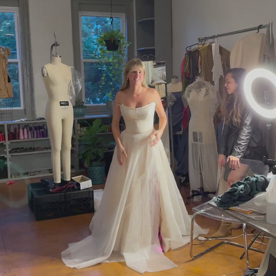 Bride in a Priscilla Couture custom wedding gown at a fitting session.