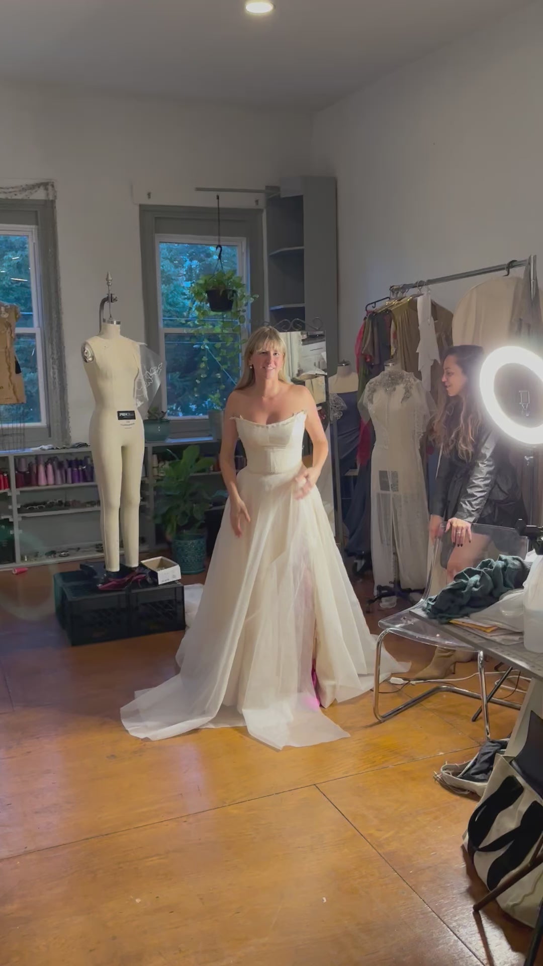 Bride in a Priscilla Couture custom wedding gown at a fitting session.
