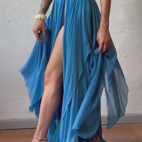 Priscilla Couture fashion model dressed in a layered blue long skirt with a lace top.