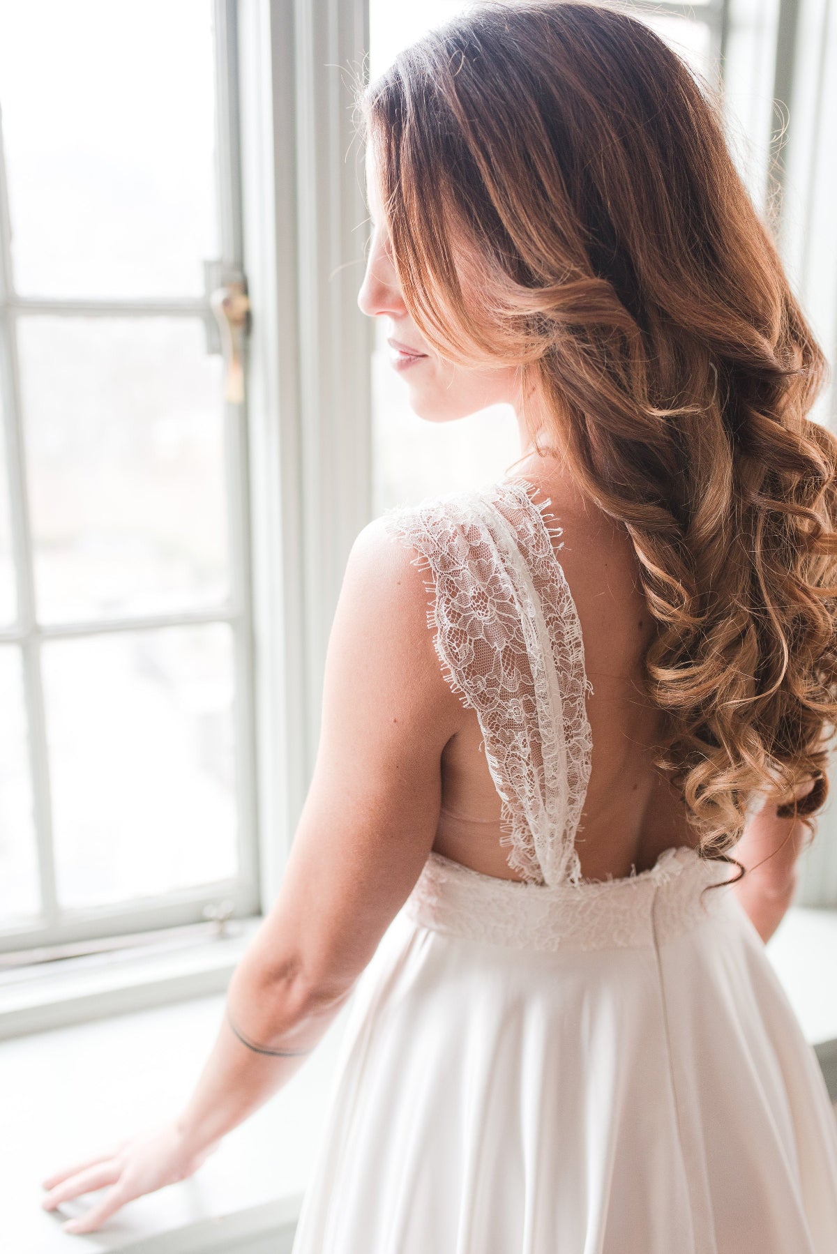 Bride wearing a Priscilla Couture Bound wedding dress