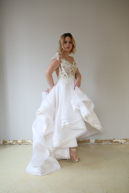 Model wearing a Priscilla Couture Dash wedding dress