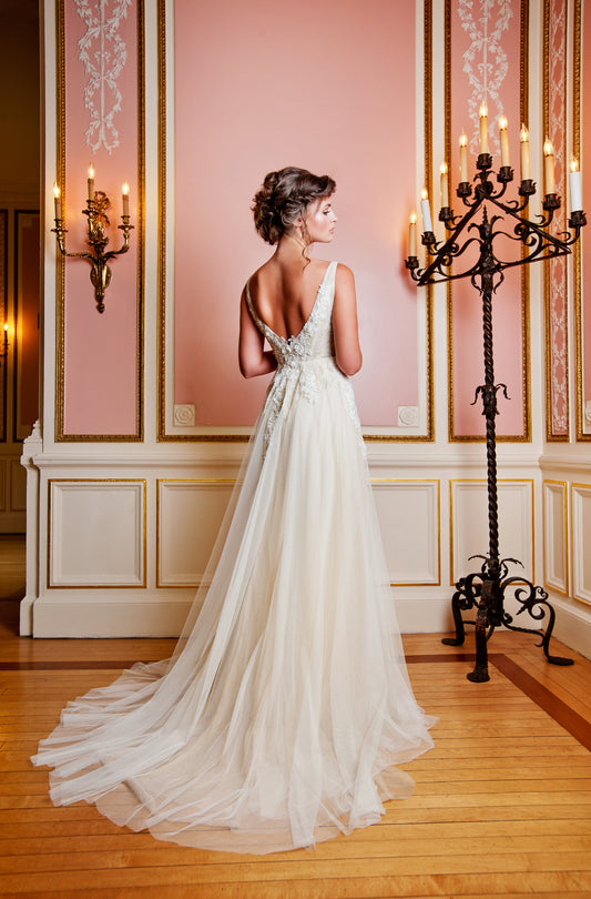 Model wearing a Priscilla Couture Enamored wedding dress